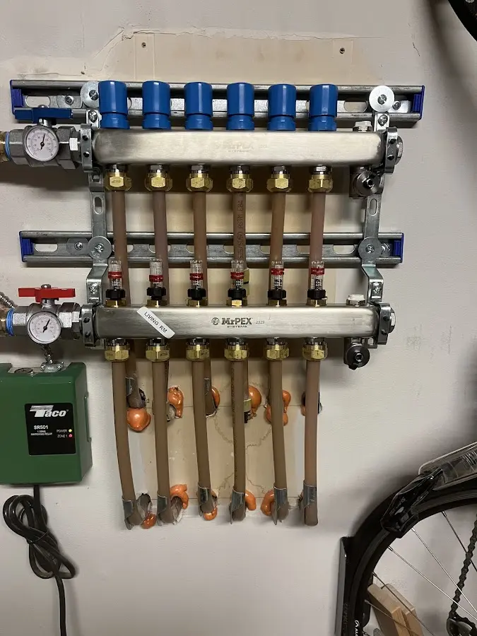 Plumber performing Water Heater Repair at a residential property in Harvest